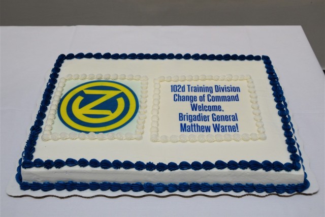 Welcome cake for Brig. Gen. Matthew S. Warne, commanding general of the 102nd Training Division.