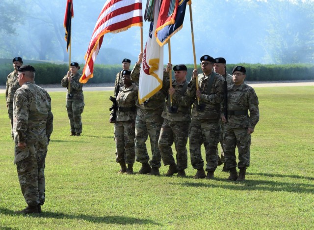 The 102nd Training Division Color Guard marching during the division&#39;s change of command ceremony at the Maneuver Support Center of Excellence Plaza at Fort Leonard Wood, Missouri, Aug. 13, 2022.