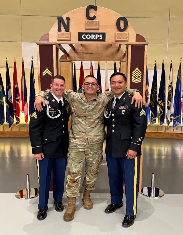 Staff Sgt. Joshua Lorber pictured with two colleagues.