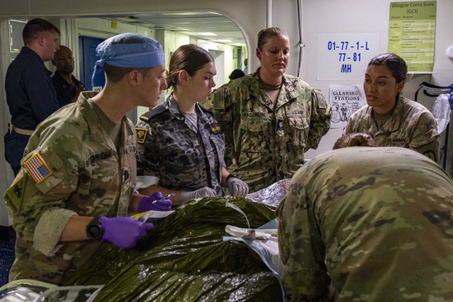 Army, Navy, and Australian medical assets provided care on board the USS Essex on to exercise patient evacuation management, surgical intervention, and prolonged casualty care at sea. 