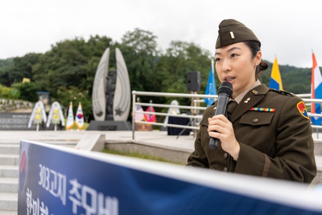 2nd Lt. Vivian Kim of 6th Ordnance Battalion addresses the crowd during a wreath laying ceremony in Waegwan, Republic of Korea, August 17, 2022. The ceremony was held in memory of the 41 U.S. Army Soldiers who were murdered by North Korean troops at Hill 303 on August 17, 1950.