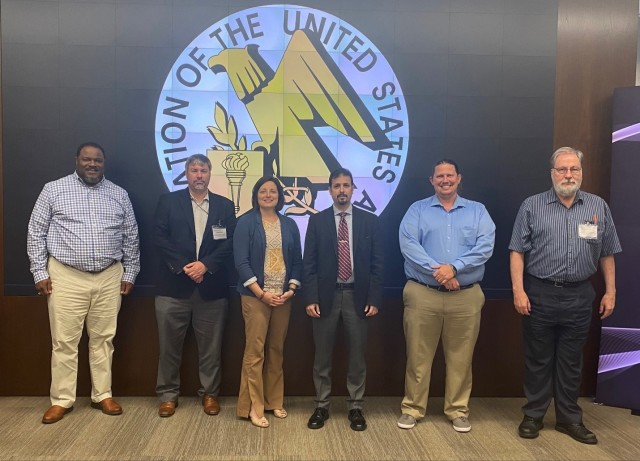 Left to right: Earl Higgins, senior acquisition analyst, DASA R&T; Keith Jadus, director for Ground, DASA R&T; Dr. Amy D’Agostino, program manager, xTech Program; Mark Cumo, project manager, Counter-IED Technology Office, DEVCOM C5ISR Center; Dr. Kyle Gallagher, electronics engineer, DEVCOM ARL; Dr. James Jensen, chemist, DEVCOM Chemical Biological Center. (U.S. Army)