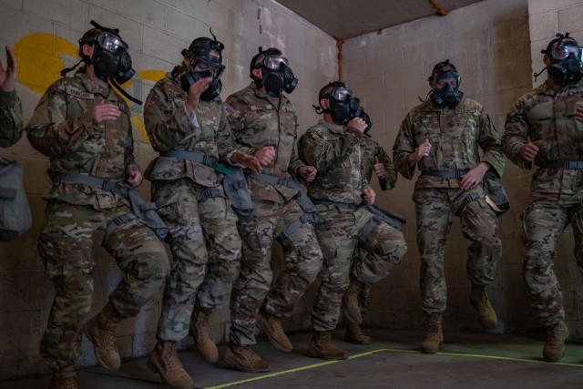 Cadets run in place after inhaling a small amount of CS gas in the CBRN (Chemical, Biological, Radiological and Nuclear) chamber for an exercise at Fort Knox, Ky., on June 5. The final test for the Cadets to undertake was a complete removal of their masks, which fully exposed them to the CS gas. | Photo by Nathan Abbott, CST Public Affairs Office