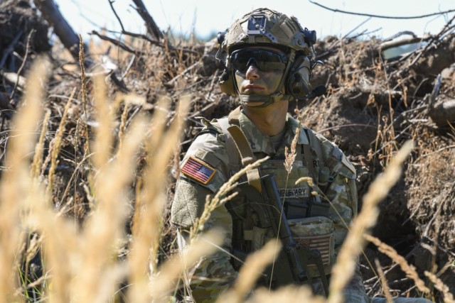 U.S. Army Sgt. Tyler Singletary, assigned to V Corps team, provides security during the U.S. Army Europe and Africa Best Squad Competition at Grafenwoehr Training Area, Germany, Aug. 9, 2022. 