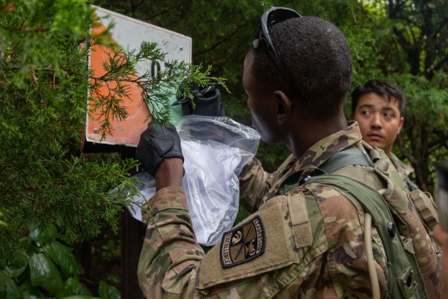 Cadets of 2nd Regiment, Basic Camp, participate in Land Navigation training at Fort Knox, Ky., July 18, 2022. The Cadets worked in groups to locate at least one out of two points using only a map, compass, protractor and pencil. | Photo by Julia Galli, CST Public Affairs Office