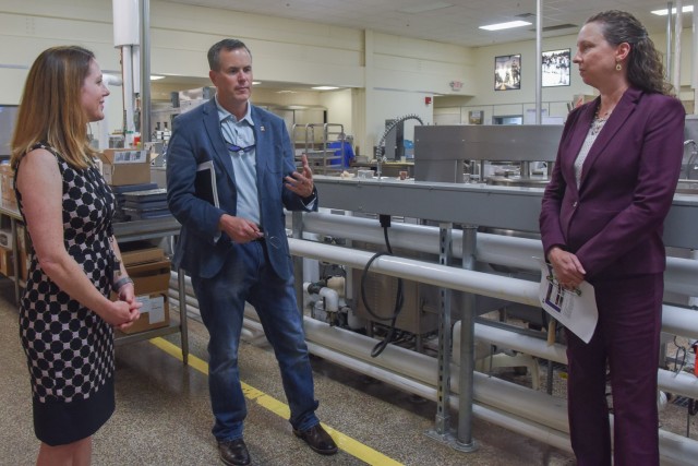 U.S Army Col. James Kent, Special Assistant to the Commanding General of Army Material Command (center), speaks with U.S. Army Combat Capabilities Development Command Soldier Center’s...