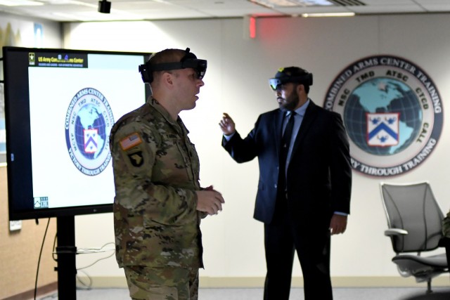 Lt. Col. Kyle Yanowski and Luis Cisneros, TRADOC Proponent Office-Synthetic Training Environment, demonstrate some of the augmented reality capabilities for participants of the Army Strategic Education Program-Command (ASEP-C) course Aug. 19, 2022 at the Combined Arms Center-Training Innovation Facility, Fort Leavenworth, Kan. ASEP-C is a developmental course for General Officers who have been selected for one and two-star level command assignments.  Photos by Tisha Swart-Entwistle, Combined Arms Center-Training Public Affairs Office.