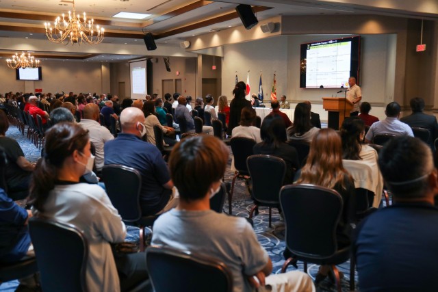 Nearly 300 employees attended a town hall virtually or in-person at the Camp Zama Community Club, Japan, Aug. 19, 2022. Leadership addressed concerns and shared updates on programs and services available to the workforce during the meeting.