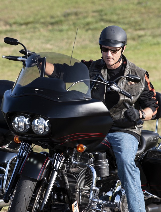 Brig. Gen. Patrick R. Michaelis, Fort Jackson commander, prepares to move his motorcycle to the starting line of the Victory Thunder Motorcycle Ride June 4.  ‘It is a good time for us to remind ourselves of how vulnerable we are as motorcycle...