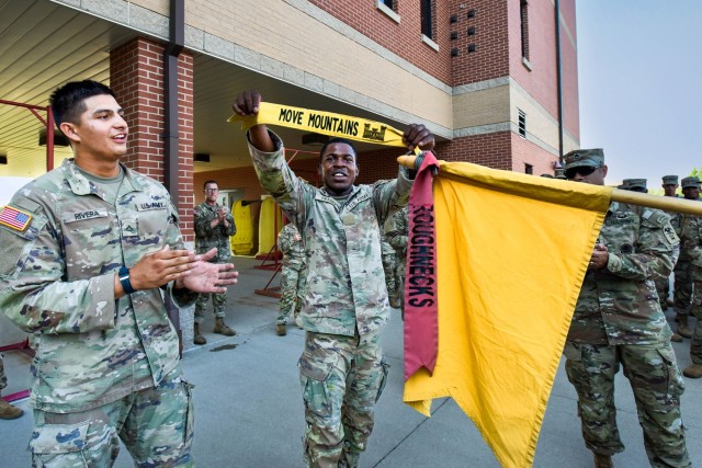 Pfc. Eli Rivera (left) and Pvt. Gabriy’el Fraser, Army Horizontal Construction Engineer Advanced Individual Training students, celebrate winning their company’s weekly Move Mountains Challenge Aug. 25 at the Company A, 554th Engineer Battalion, barracks building. The challenge – which pits the company’s platoons against each other in competition for bragging rights – was instituted at the unit earlier this year to help instill platoon cohesion through team-building exercises that test the Soldiers’ physical and mental strengths.