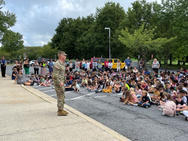 In accordance with a long-standing tradition at Fort Detrick, Garrison Command Sgt. Maj. Michael Dills and Soldiers from the post helped raise the U.S. flag on the first day of school at Whittier Elementary School. 