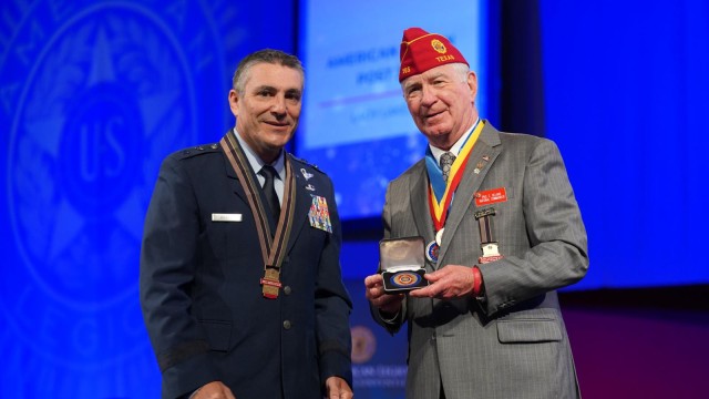 Maj. Gen. Paul Knapp accepts the 2022 American Legion National Education Award on behalf of the National Guard Bureau at The American Legion 103rd National Convention at the Milwaukee Center in Milwaukee Aug. 31, 2022. The award was presented for the National Guard Youth ChalleNGe program, which helps “at-risk” teens earn their high school diploma or GED. (Courtesy Jeric Wilhelmsen, American Legion)
