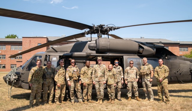 10th Special Forces Group pause for a photo with Garrison Commander LTC Colestock & BG Salisbury