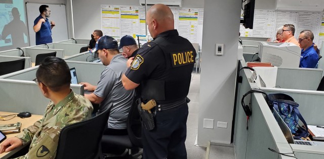 Fort Buchanan's Directorate of Plans, Training, Mobilization and Security took the lead at the Emergency Operations Center served as the central hub for communication during the Active Shooter Exercise, August 30, 2022. DPTMS Emergency Management Specialist, Félix Otero provides an up-brief to garrison staff and tenants during the exercise.