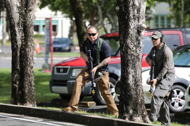 Fort Buchanan Active Shooter Exercise was based on a scenario where two active shooters arrived at the premises of Antilles High School carrying assault weapons and proceed to open fire upon students. The active shooter roles were played by members of the 1st Mission Support Command 301st MP Co.