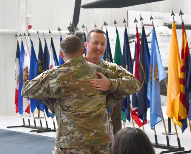 Col. Matt Parker welcomes Sgt. Maj. Devon Weber to ACLC.