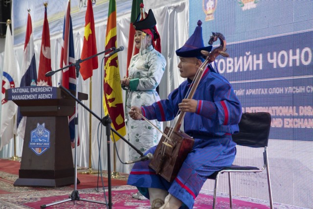 Traditional Mongolian performers sing and play the morin khurr, or horsehead fiddle, during the opening ceremony for Gobi Wolf 2022 in Bayankhongor, Mongolia, Sept. 5. Gobi Wolf is a disaster response exercise designed to test disaster response...