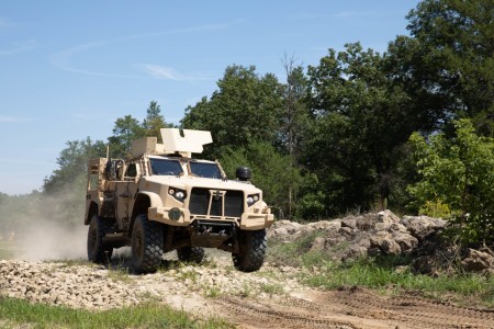 Driving through off-road obstacles showcases the Joint Light Tactical Vehicles’ capabilities to maneuver over uneven surfaces at Fort McCoy, Wisconsin, Aug. 17, 2022. The JLTV is a part of an Army-led, joint-force program, designed to replace vehicles across the Department of Defense. Project Convergence is the Army’s campaign of learning, designed to aggressively advance and integrate Army’s contributions to the Joint Force. It ensures that the Army, as part of the Joint and Combined fight, can rapidly and continuously converge effects across all domains — air, land, sea and space.