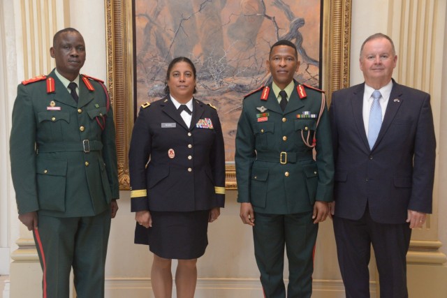 Left to right, Col. Oz Ntloore, Botswana Defence Force chief legal adviser; Brig. Gen. Cristina Moore, North Carolina National Guard assistant adjutant general of sustainment; Maj. Gen. Mpho Mophuting, deputy commander of the Botswana Defence Force; retired Col. Rick Fay, NCNG chief legal adviser; after a panel discussion about ways to enhance the relationship between commanders and their legal advisers during the African Military Law Forum in Gaborone, Botswana, Aug. 6-10. The forum brought together African military legal professionals from 37 African countries.
