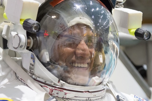 Lt. Col. Frank Rubio smiles for the camera while being suited up for EVA training. Rubio is scheduled to be making his first venture into space Sept. 21 when he launches from the Baikonur Cosmodrome to the International Space Station as a NASA...