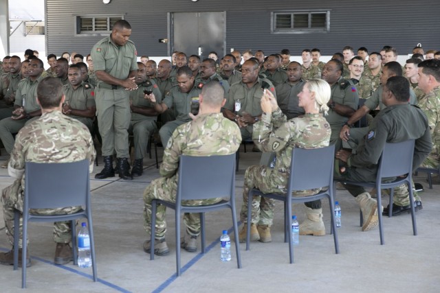 Members of the 3rd Battalion, Fiji Infantry Regiment sing and pass around Kava during the opening ceremony to start off Exercise Cartwheel 2022 at Black Rock Camp, Fiji. Military-to-military training improves the readiness not only for U.S. and RFMF forces but for all nations participating, increasing capabilities to respond to a crisis and contingencies. (U.S. Army photo by Sgt. 1st Class Andrew Guffey 343rd Mobile Public Affairs Detachment)
