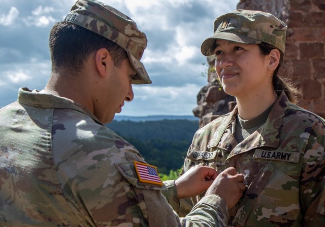 Father promotes daughter while deployed