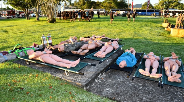 In acts of tribute in addition to their rucksacks, service members carried litters-medical stretchers with 150 lb. mannequins, firefighting tools and varied sizes of hose packs some weighing 30 lbs. reenacting the sacrifices of first responders on...