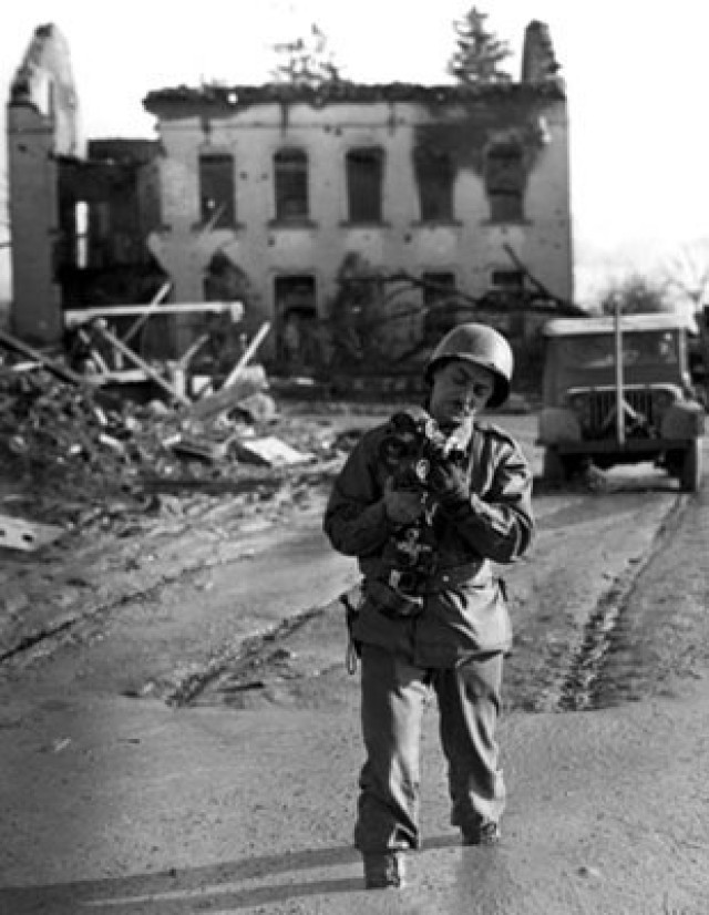 Signal Corps cameraman Sgt. Aaron Lubitsch in Belgium, 1945.