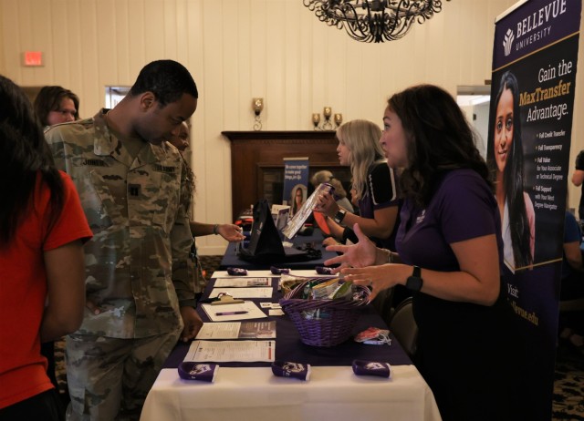 Attendees of the Fort Knox Career & Education Fair Sep. 15, 2022 speak with representatives from one of the more than 100 education institutions and employers at the event.