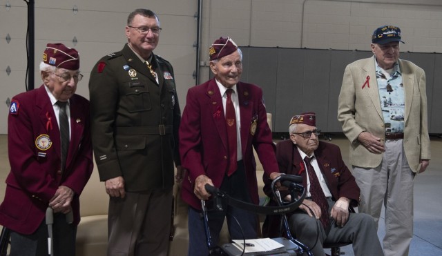 From left: Clyde Cassidy, Maj. Gen. Greg Knight, Richard H. Hamilton, William B. Busier and Ralph McClintock pose for a group photo after the POW/MIA Day observance at Camp Johnson, Vermont, Sept. 16, 2022. Knight is Vermont&#39;s adjutant general. Cassidy, Hamilton and Busier are former World War II POWs, and McClintock is a former crew member of the U.S.S. Pueblo, which was captured by North Korea in 1968. (U.S. Army National Guard photo by Don Branum)
