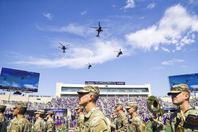 AH-64 Apache Helicopters of the 1st Combat Aviation Brigade, 1st Infantry Division, conduct a flyover of Kansas State University’s Fort Riley Day, September 17, 2022. KSU holds their Fort Riley Appreciation Day annually, where they honor military service members both at home and overseas. (Courtesy photo)