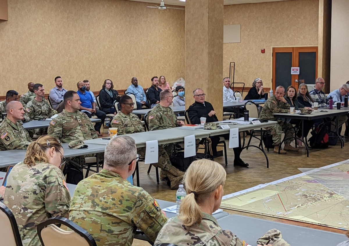 The Commanding General of MRDC and Fort Detrick, Brig. Gen. Anthony McQueen, (center, black coat), participated the Medical Rehearsal of Concept (ROC Drill) on Fort Detrick, Maryland, August 31, 2022. MRDC is critical to Army Medical Modernization and a key organization in support of medical technologies in Project Convergence 22. (Courtesy)