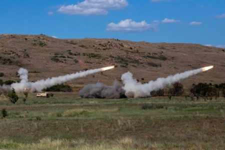 A pair of M270A1 MLRS (Multiple Launch Rocket Systems) from Fort Sill’s 3rd Battalion, 13th Field Artillery Regiment launch rockets during Operation Daring Warrior Sep. 17, 2022.
