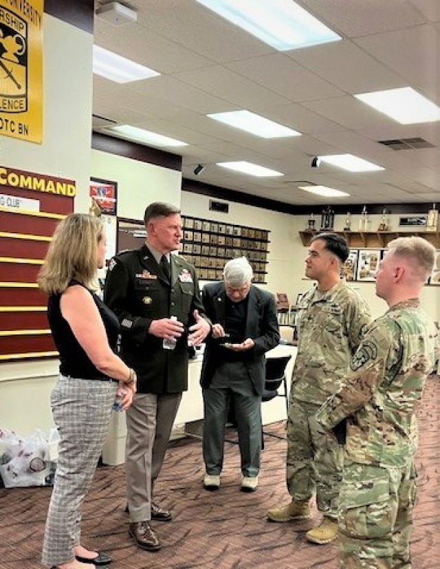 Maj. Gen. Darren Werner, commanding general for the U.S. Army Tank-automotive and Armaments Command, talks with two Chippewa Battalion Reserve Officer Training Corps cadets during a visit to Central Michigan University Sept. 15. 