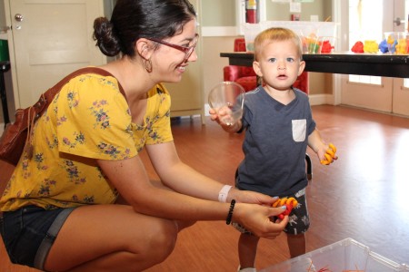 A family plays with sensory toys at the Army Community Service Sensory Gala July 22, 2022 at the New Parent Support Program Building on Fort Rucker. Photo by Jay Mann.