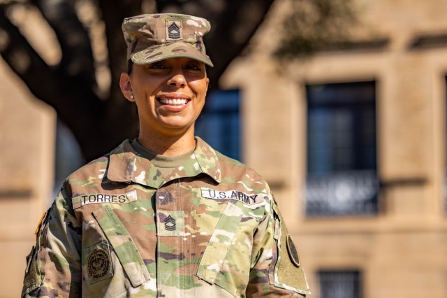 U.S. Army South Soldier, Master Sgt. Kathryan Torres, command lead sexual assault response coordinator, stands in front of Army South headquarters on Joint Base San Antonio-Fort Sam Houston, Sept. 21, 2022. Torres&#39; journey to Army service was forged by great parenting and a supportive family. (U.S. Army photo by Spc. Joshua Taeckens)