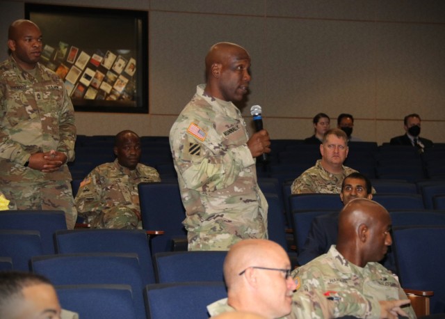 Col. Dexter Nunnally, division chief for the U.S. Army Forces Command, asks a question during a discussion at the inaugural C5ISR Readiness Summit at the Myer Auditorium here Sept. 13, 2022.