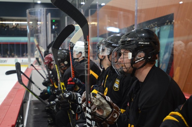 Navy sinks Army on ice in overtime