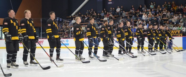 Navy sinks Army on ice in overtime