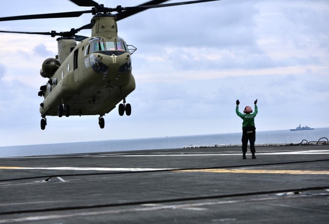 Eighth Army Chinooks conduct deck landings on US Navy carrier