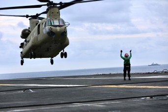 Eighth Army Chinooks Conduct Deck Landings on Navy carrier