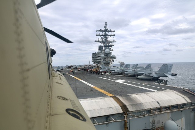 Eighth Army Chinooks conduct deck landings on US Navy carrier