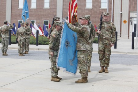 Col. Maria C. Borbon (left), outgoing commander of the 902d Military Intelligence Group, and Command Sgt. Maj. Jesse Crawford uncase the new colors for the Army Counterintelligence Command, symbolizing its activation at ACIC headquarters, Fort George G. Meade, Maryland, 28 July. ACIC is tasked with conducting worldwide CI activities to detect, identify, neutralize and exploit foreign intelligence, international terrorists, insider threats and other foreign adversaries in order to protect the U.S. Army and DoD strategic advantage. 