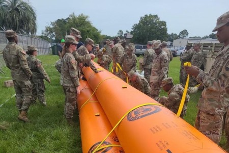 Florida National Guard Soldiers with the 146th Expeditionary Signal Battalion completed training on the Tiger Dam system. This system is a water filled bladder capable of diverting flood waters within minutes.