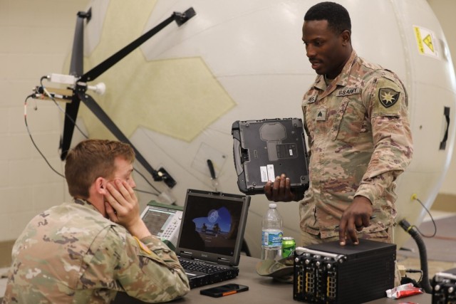 Sgt. Kasey Jones and Spc. Jeremiah White, soldiers from the Florida National Guard’s 146th Expeditionary Signal Battalion, discuss network equipment crucial to the relief effort with oncoming Hurricane Ian. Governor Ron Desantis called upon the combined strength of the Florida National Guard to provide support wherever needed, with signal capabilities targeting the possibility of incapacitated networks across the state.