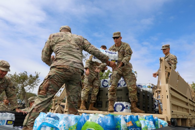 U.S. Army Soldiers with the Florida National Guard&#39;s Chemical, Biological, Radiological/Nuclear, and Explosive (CBRNE) - Enhanced Response Force Package (FL-CERFP) load supplies during the Hurricane Ian response, Sarasota, Fla., Sept. 29, 2022. Soldiers and Airmen were joined by emergency responders from other states as they mobilized to support the local community. FL-CERFP provides search and extraction capabilities using ground and maritime operations. (U.S. Army photo by Sgt. N.W. Huertas)