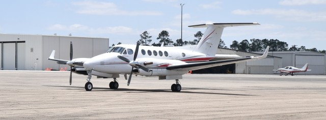 A Beechcraft Super King 300 taxis on the runaway at he Joint Airborne Lidar Bathymetry Technical Center of Expertise (JALBTCX’s) at Stennis International Airport, Mississippi April 18, 2022.  
The aircraft is equipped to gather data and imagery for JALBTCX’s mapping program.  As part of a recent foreign military sales case, Panama has received the Beechcraft King Air 250 version. 