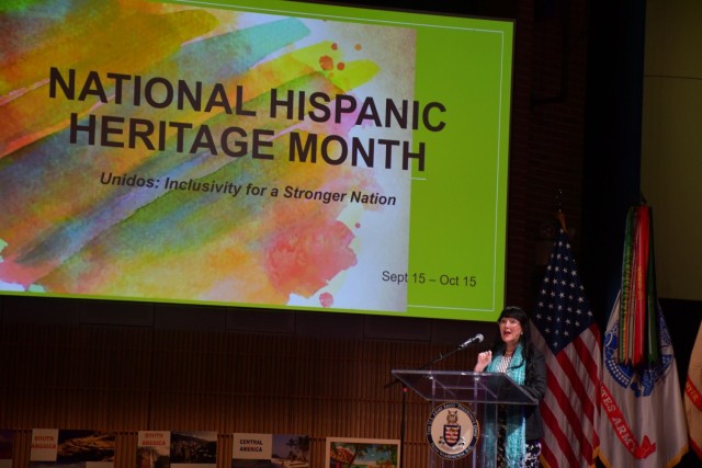 Retired Brig. Gen. Dr. Irene Zoppi speaks at JBM-HH during National Hispanic Heritage Month observation