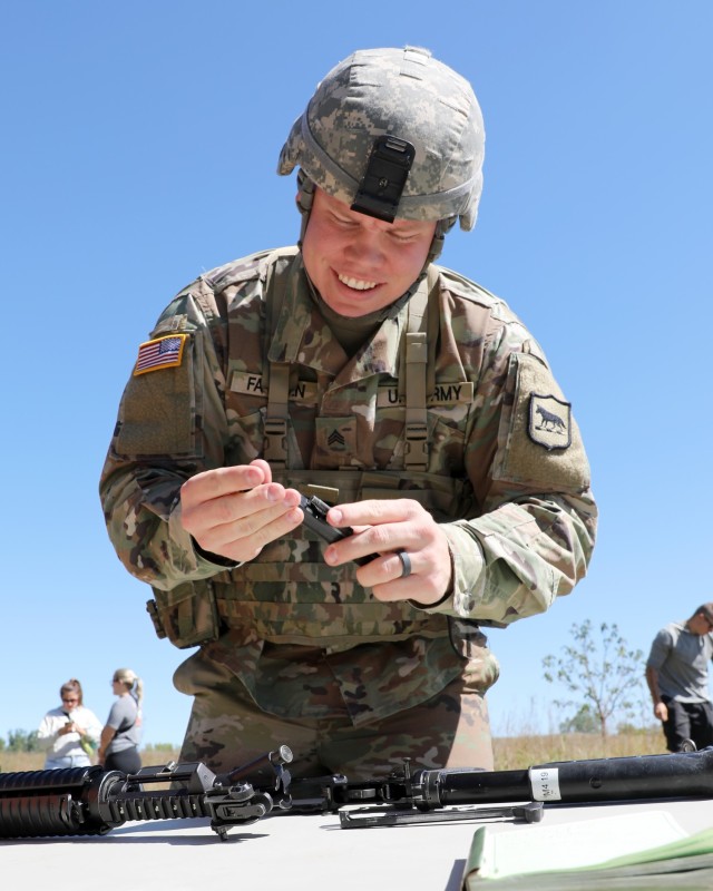 U.S. Army Sgt. Braxton Farmen, 740th Transportation Company, South Dakota Army National Guard, assembles a weapon during the 152nd Combat Sustainment Support Battalion’s first Best Squad Competition at Dakota Nature Park in Brookings, S.D.,...