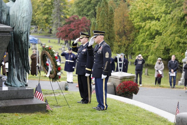 New York Army National Guard Maj. Gen. Michel Natali, the assistant adjutant general, Army, and Command Sgt. Maj. Robert Jenks, the senior enlisted leader of New York's Joint Force Headquarters, place the presidential wreath at the grave of...